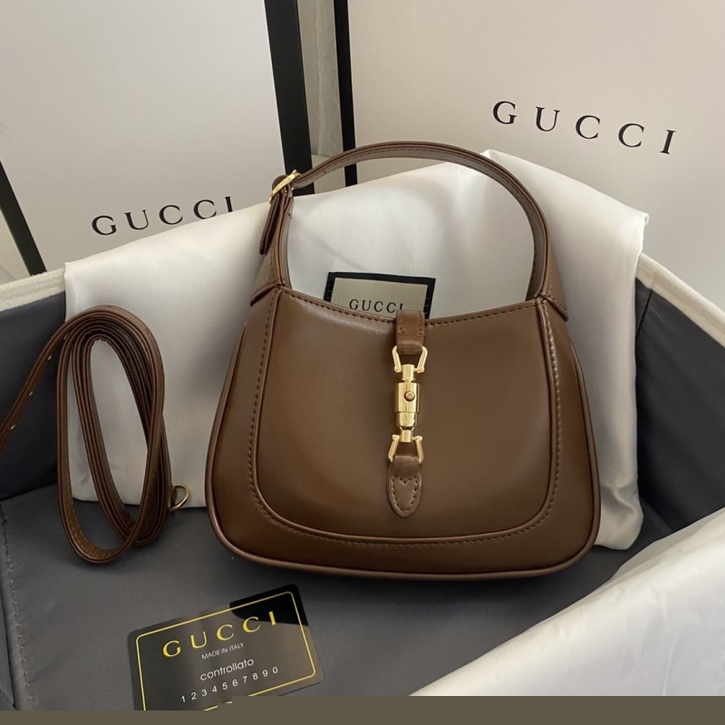 G*u*i top handle bags